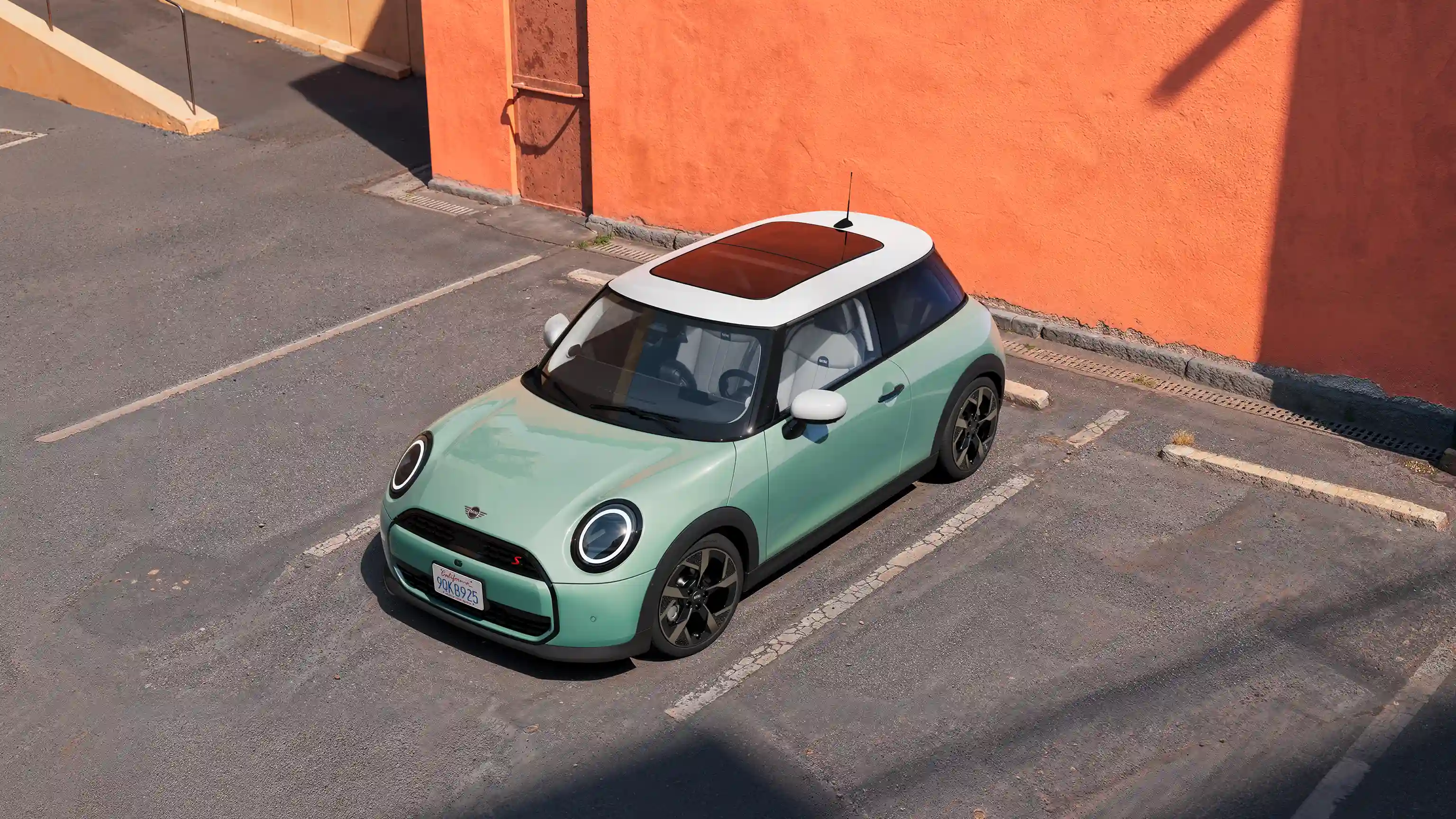 Video showcasing the interior and exterior of a MINI Cooper in detail. The camera pans over the dashboard, highlighting design elements.