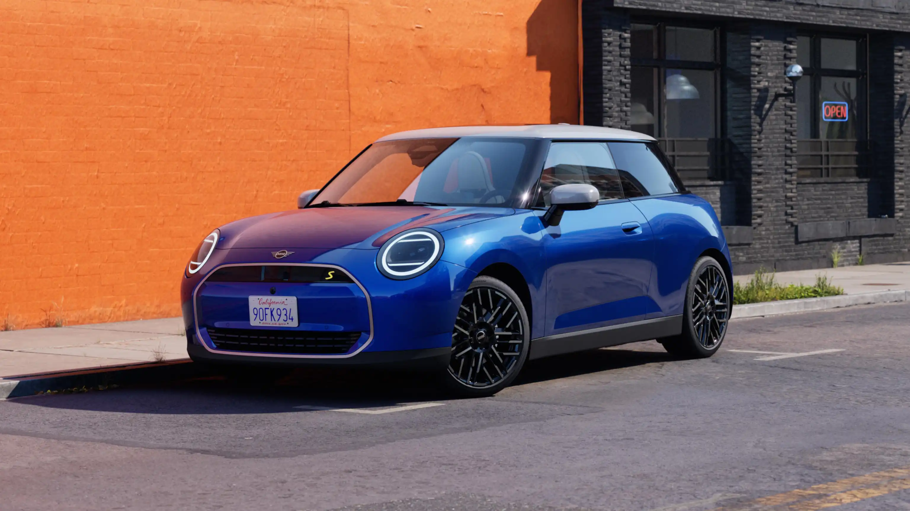 Video showcasing the interior and exterior of a all-electric MINI Cooper in detail. The camera pans over the dashboard, highlighting design elements
