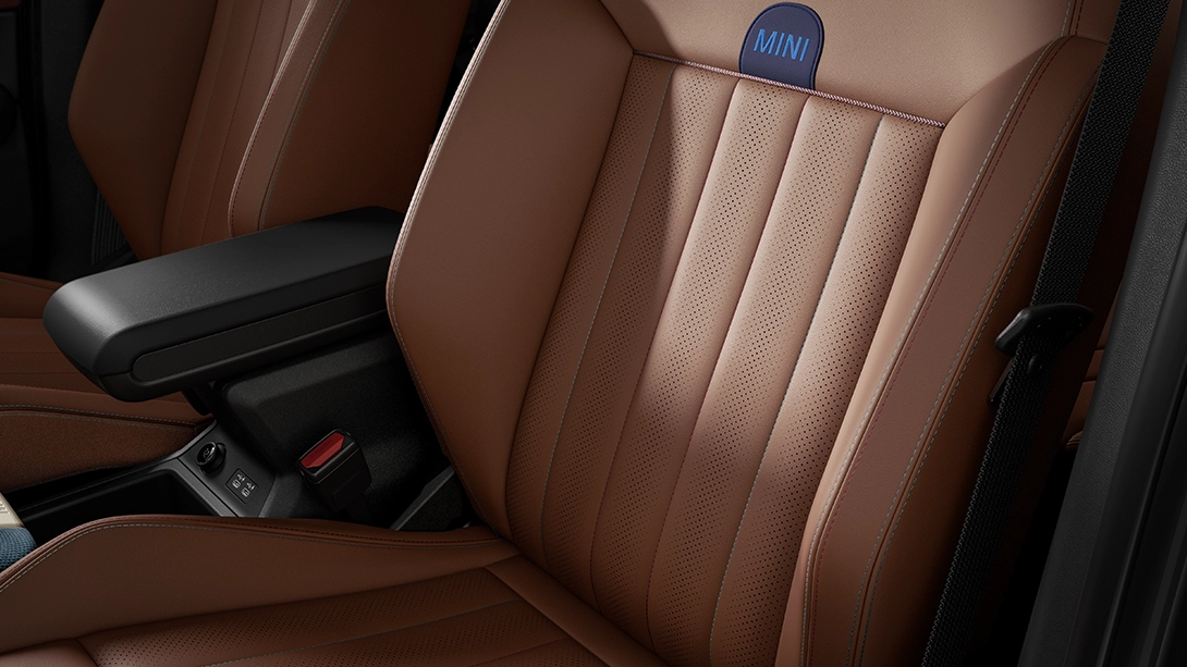 View of the MINI Countryman Favoured Style showing the armrest and Vintage Brown Vescin seats