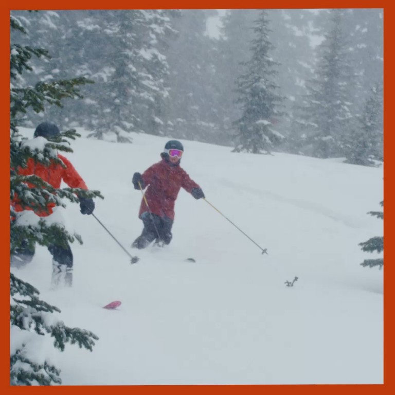 : A GIF of a skiing “Silver Sliders” in snowy mountain landscape of British Columbia, Canada.