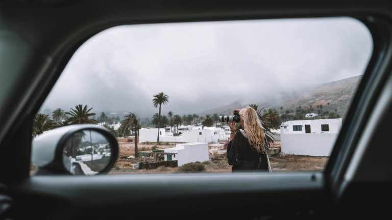 View from the passenger seat: Katarina photographing the landscape.